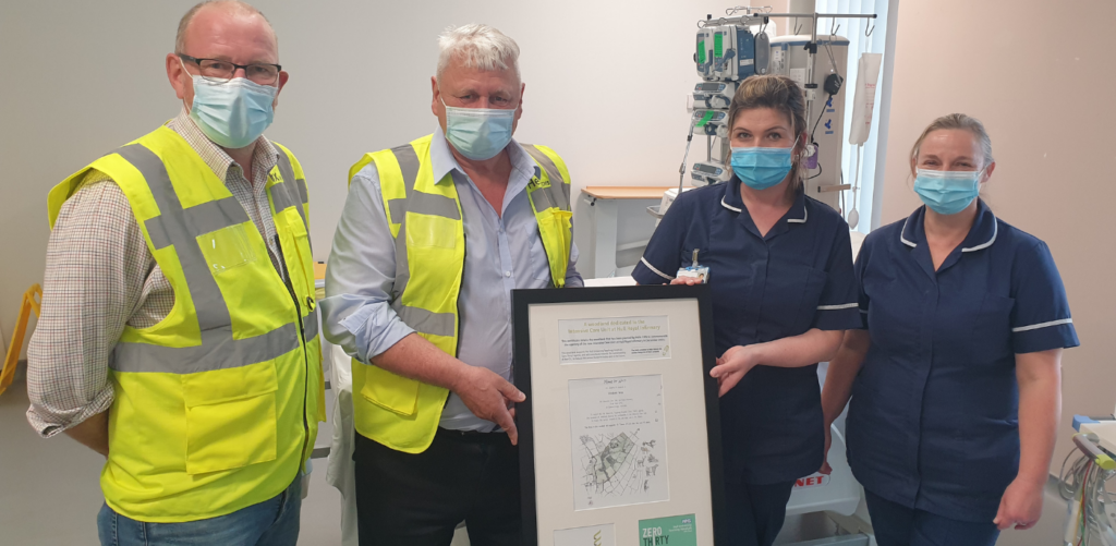 Helix and ICU staff with certificate